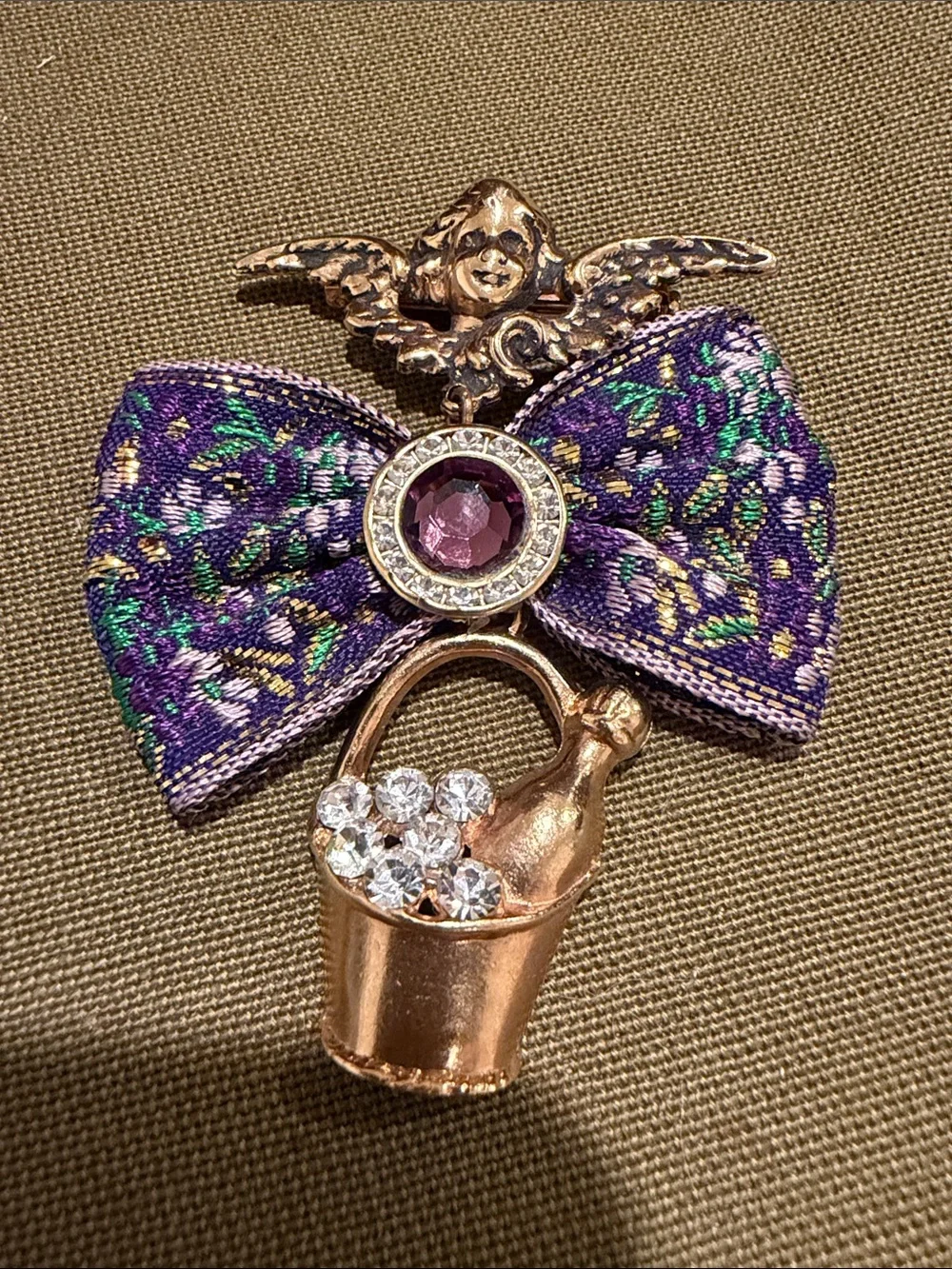 VTG Gold-Tone Cherub Bow Brooch with Purple Gem and Crystal Bucket 3 inches